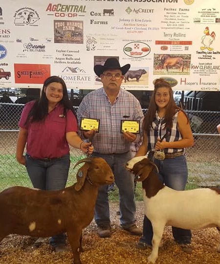 Parker Girls posing with their prized goats 